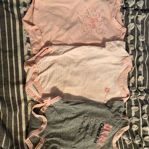 6-9 month dkny onsies (3)